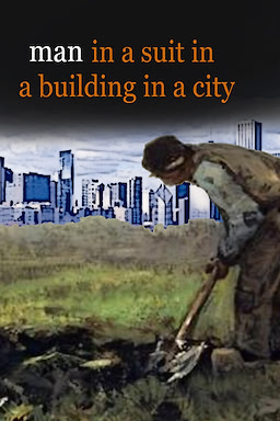 Man in a suit in a building in a city